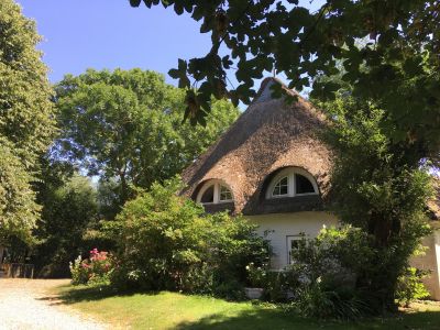 Haus am Watt Seitenansicht mit Reetdach Nordsee